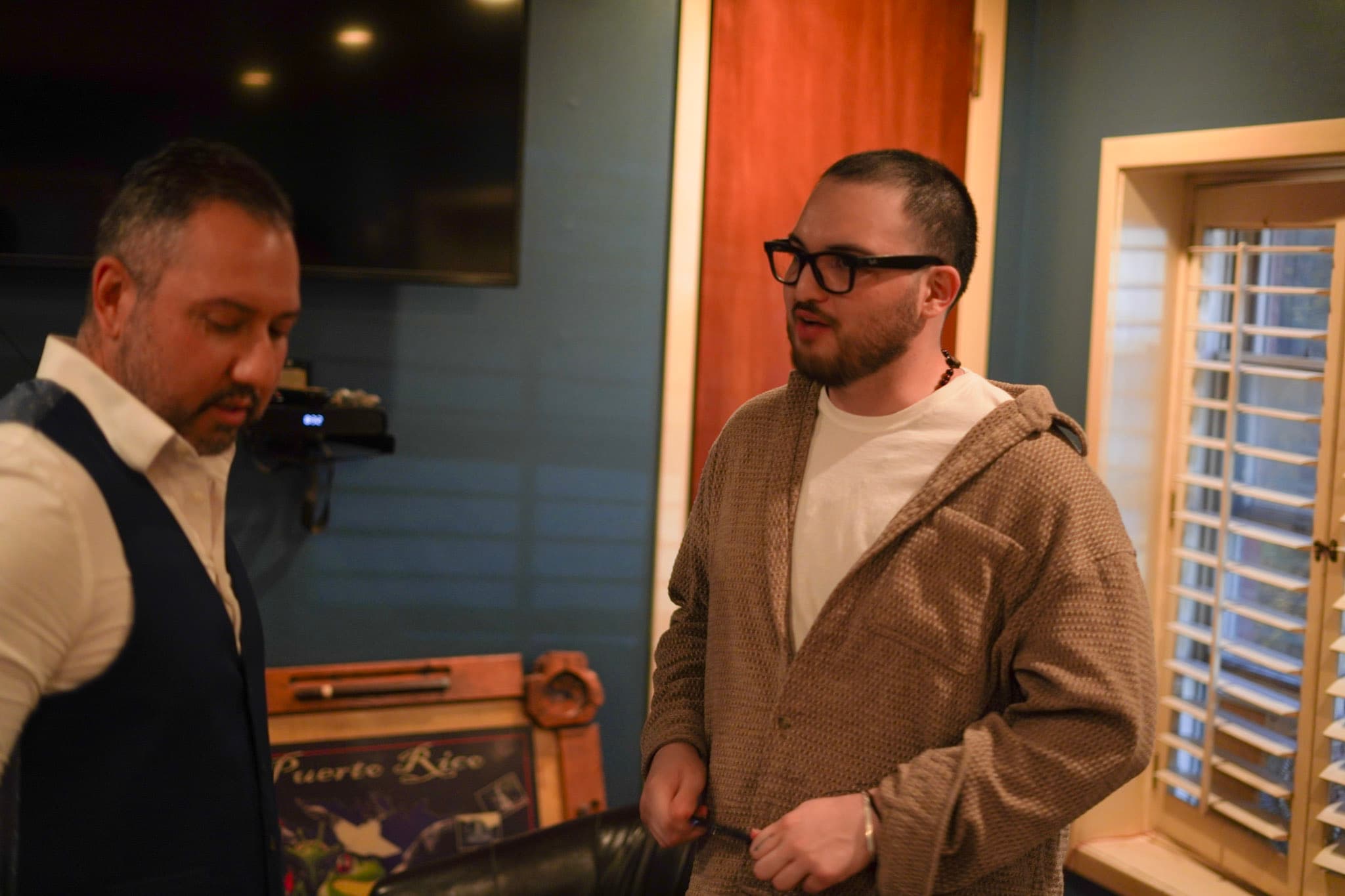 Fumio Flores talking backstage with another comedian